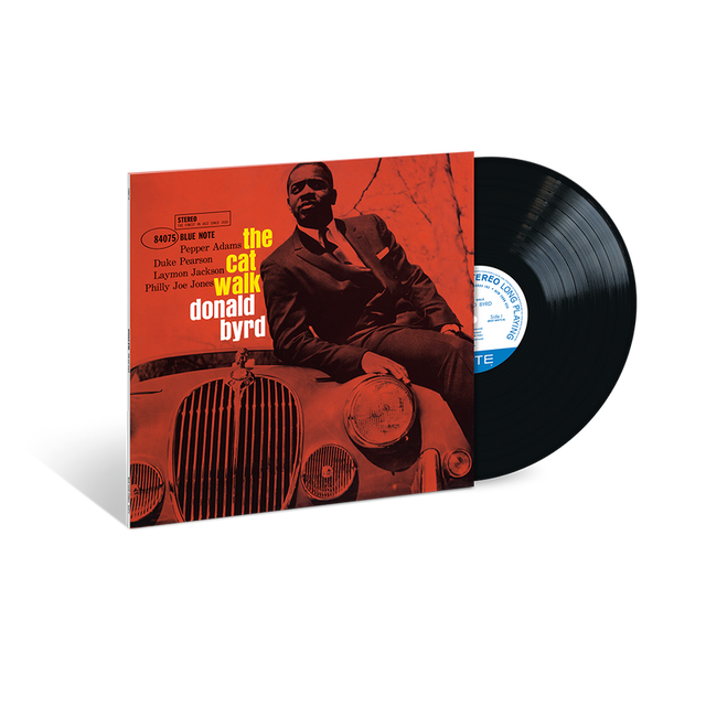 Vinyl record with cover featuring a person sitting on a car, on a white background