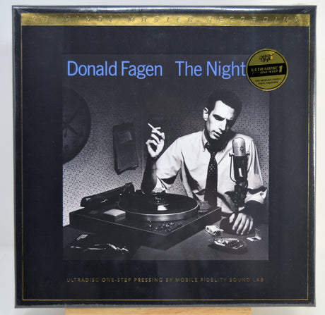 Donald Fagen's 'The Night' 12-inch Ultradisc vinyl record album cover, featuring a black-and-white photo of a man at a turntable and microphone, with a gold 'Ultradisc Vinyl' sticker in the top right.