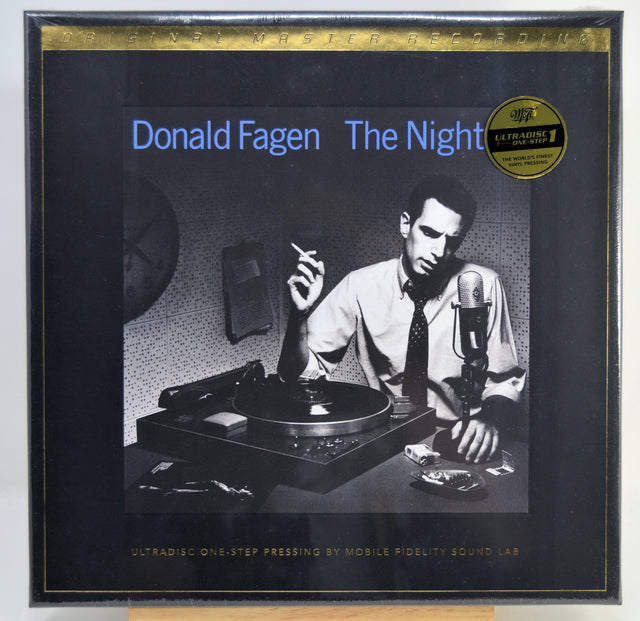 Donald Fagen's 'The Night' 12-inch Ultradisc vinyl record album cover, featuring a black-and-white photo of a man at a turntable and microphone, with a gold 'Ultradisc Vinyl' sticker in the top right.