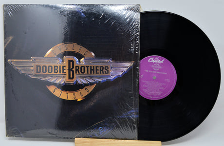 Vinyl record with cover featuring the Doobie Brothers logo on a white background