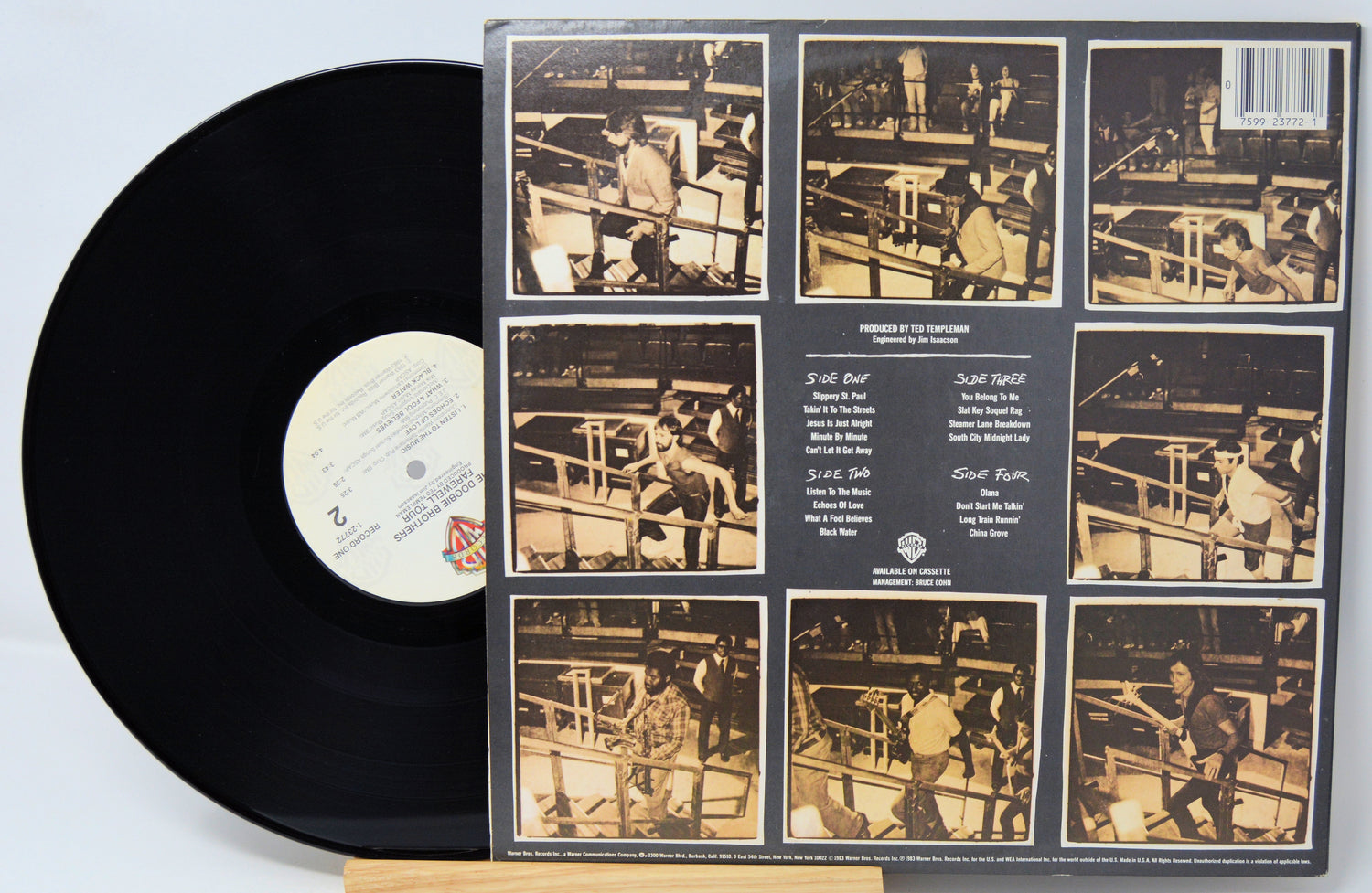 Vinyl record with a detailed cover featuring black and white images of a boxer in action.