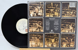 Vinyl record with a detailed cover featuring black and white images of a boxer in action.