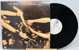 Vinyl record with cover showing a guitar and hands, titled 'The Double Brothers Farewell Tour'.