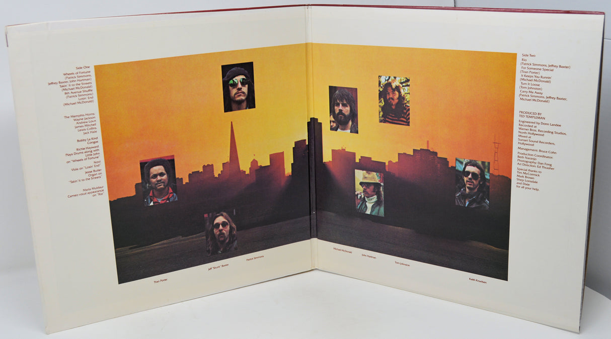 Album cover with a cityscape and portrait layout on an orange background