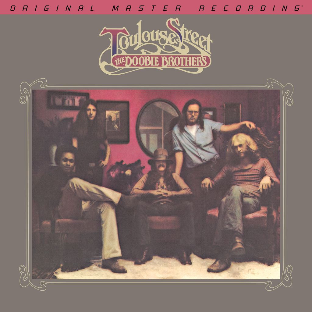 Album cover featuring a group of people in a room with 'Toulouse Street' and 'The Doobie Brothers' text.