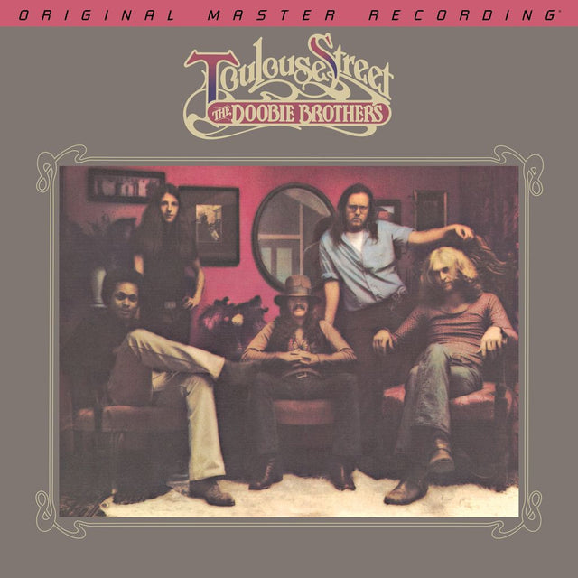Album cover featuring a group of people in a room with 'Toulouse Street' and 'The Doobie Brothers' text.