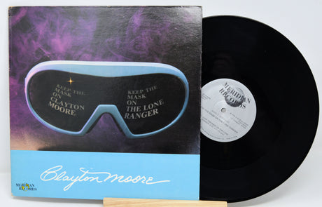 Vinyl record with a mask design and 'Clayton Moore' branding on a white background