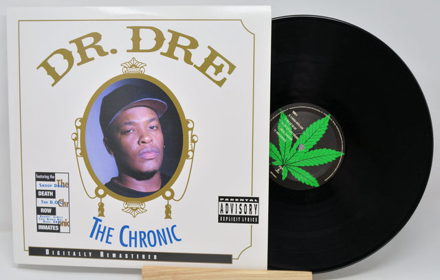 Vinyl record and cover of 'The Chronic' by Dr. Dre on a white background