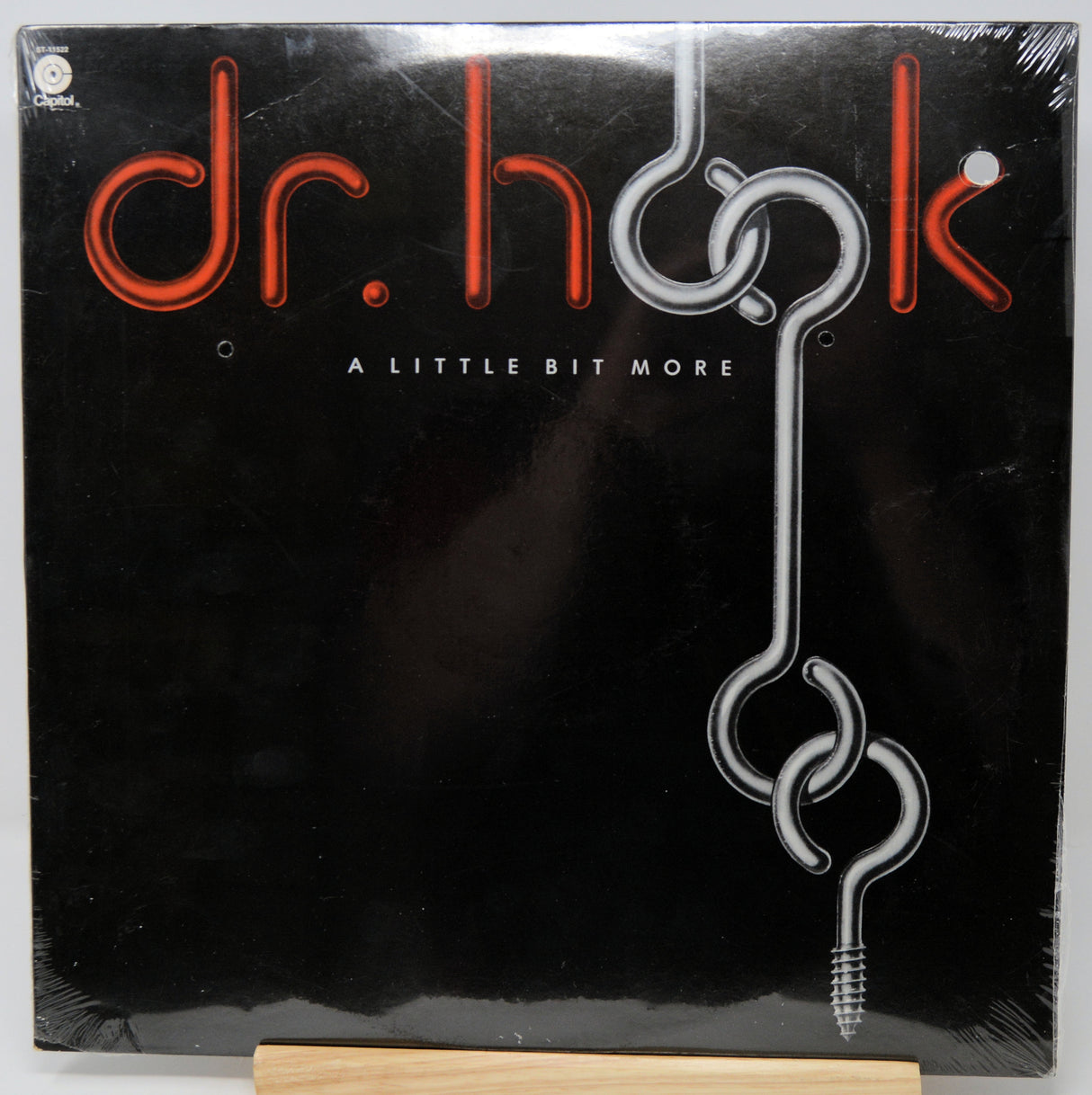 Vinyl record cover for 'A Little Bit More' by Dr. Hook on a black background.