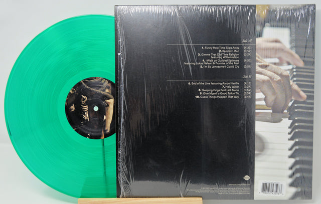 Back cover of Dr. John 'Things Happen That Way' green vinyl record showing track list and hands playing piano