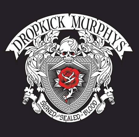 A graphic design featuring a white ornate crest with a skull, red rose, and decorative scrollwork, with the text 'DROPKICK MURPHYS' at the top and 'SIGNED AND SEALED IN BLOOD' at the bottom, shown on a dark background.