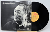 Vinyl record album 'The Intimate Ellington' with the black LP partially pulled from the sleeve, showing a black-and-white portrait on the cover and a yellow label on the record.