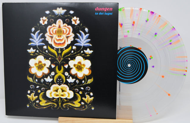 Vinyl record with decorative cover and multicolored label