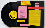 Vinyl record with cover featuring 'Kent' branding and colorful text