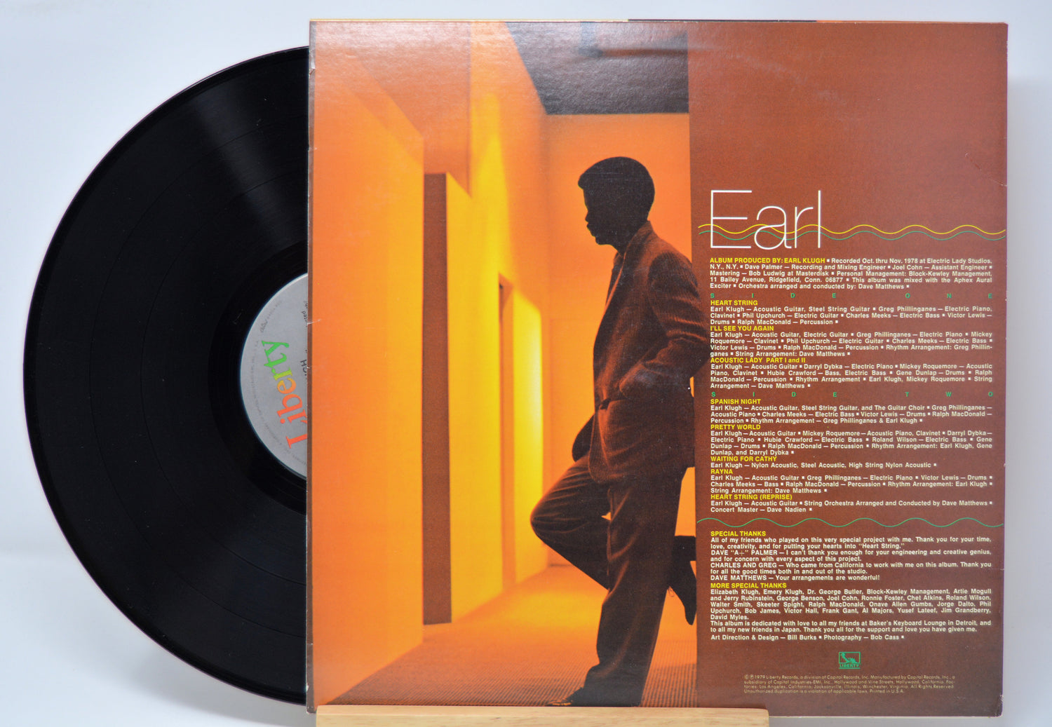 'Earl Klugh Heart String' Vinyl record with a cover featuring a silhouette of him and text on a light blue background