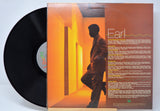 'Earl Klugh Heart String' Vinyl record with a cover featuring a silhouette of him and text on a light blue background