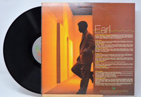'Earl Klugh Heart String' Vinyl record with a cover featuring a silhouette of him and text on a light blue background