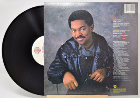 'Earl Klugh Soda Fountain Shuffle' Vinyl record with a cover featuring a person, on a light gray background