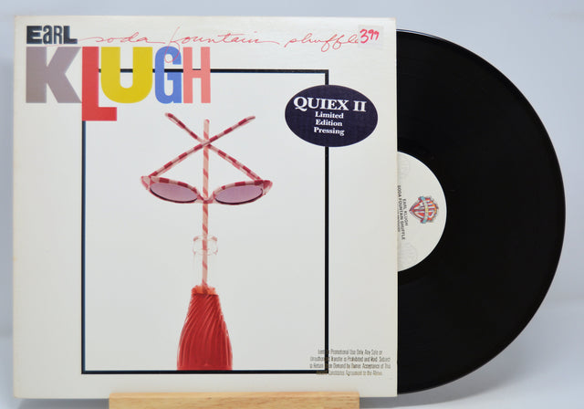 Vinyl record with a colorful cover featuring the name Earl Klugh, Soda Fountain Shuffle and a limited edition label.