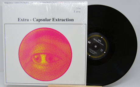 Front cover of Earth’s 'Extra-Capsular Extraction' LP featuring bold pink-yellow abstract eye artwork