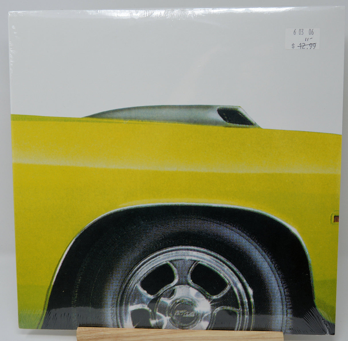 Front cover of Earth Pentastar: In The Style Of Demons LP featuring yellow muscle car close-up