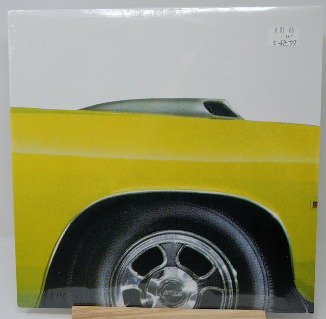 Front cover of Earth Pentastar: In The Style Of Demons LP featuring yellow muscle car close-up