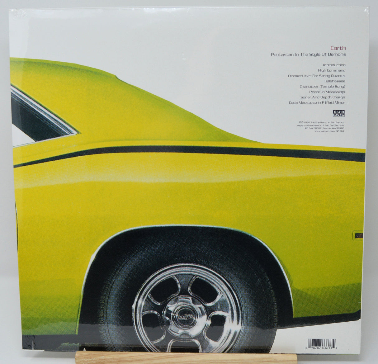 Back cover of Earth Pentastar: In The Style Of Demons vinyl with yellow muscle car artwork