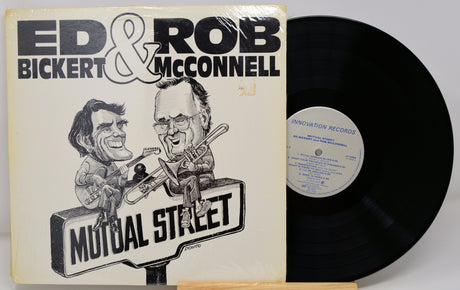 Front cover of Ed Bickert & Rob McConnell's 'Mutual Street' vinyl showing caricature artwork