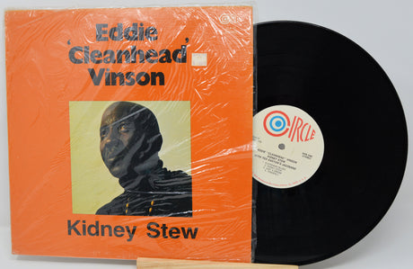 Vinyl record with orange cover featuring a portrait and 'Eddie Cleanhead Vinson' text.
