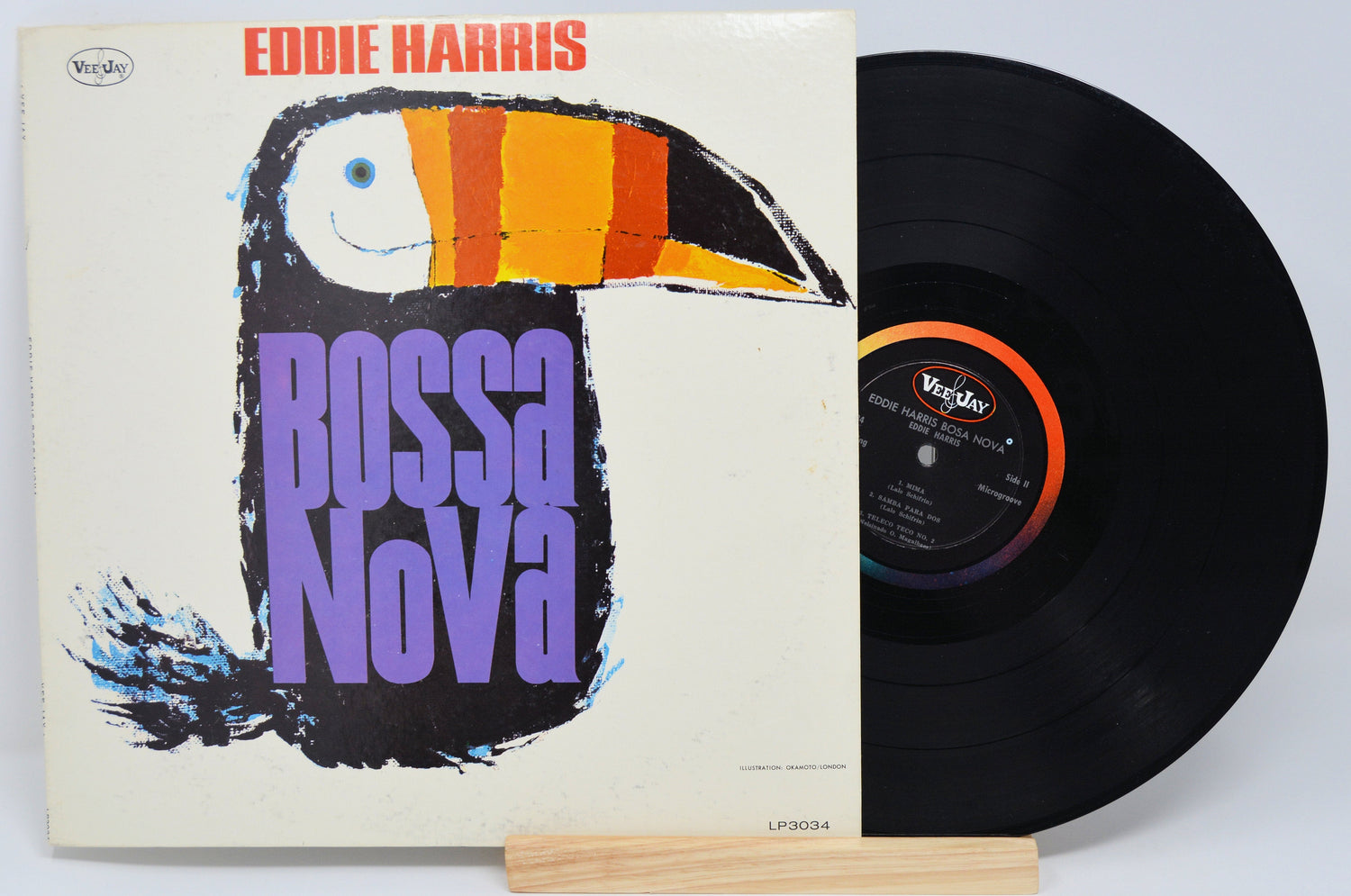Front cover and vinyl record of Eddie Harris Bossa Nova LP featuring stylized toucan artwork