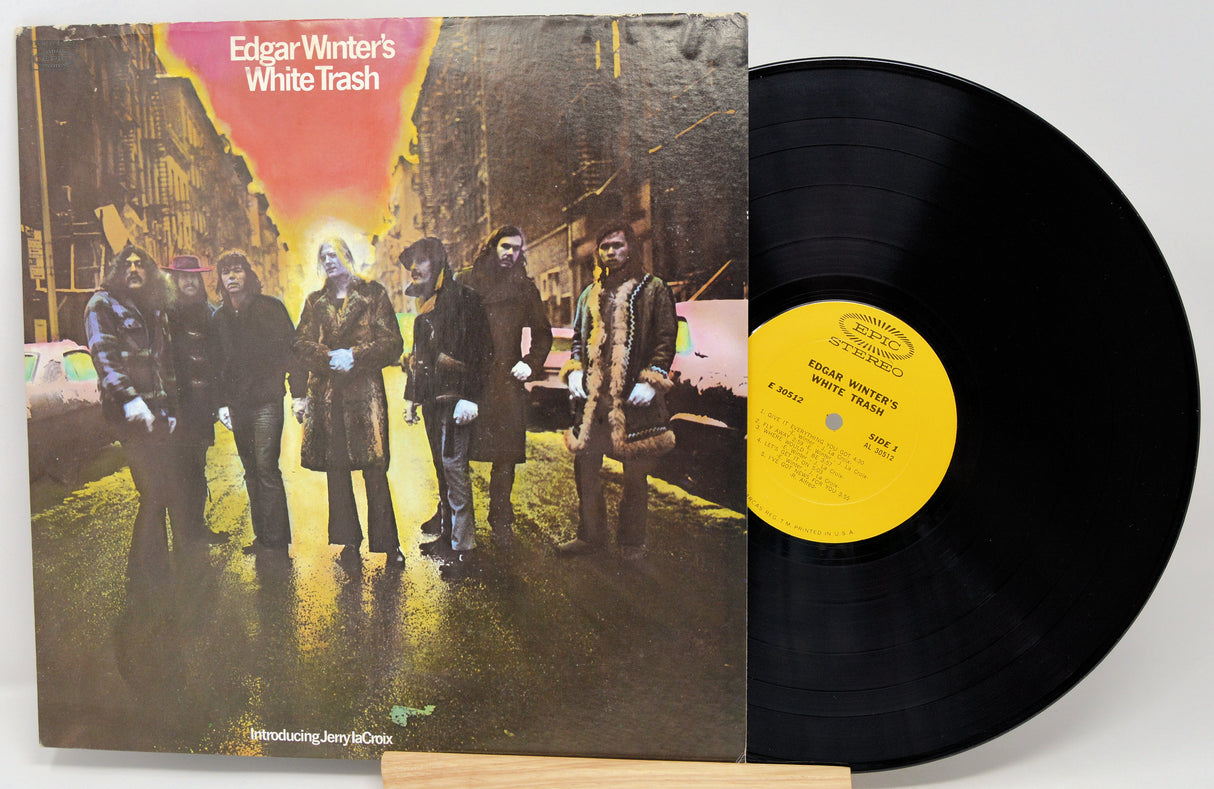 Vinyl record with cover featuring a group of people on a city street, titled 'Edgar Winter's White Trash'.
