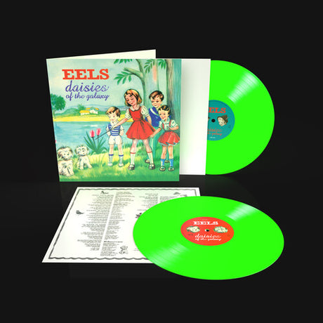 Green vinyl records with a colorful album cover featuring children and a dog on a black background.