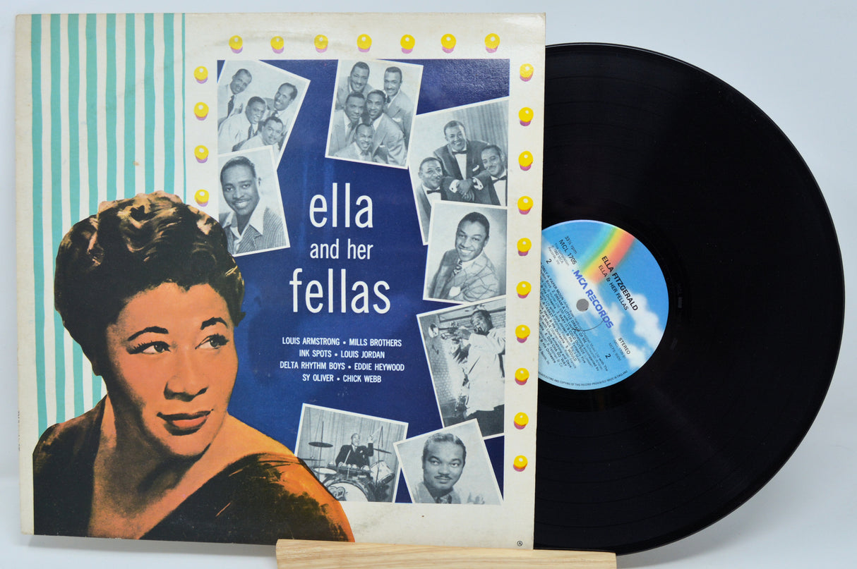 Vinyl record with cover featuring 'Ella and her Fellas' on a light blue background
