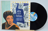 Vinyl record with cover featuring 'Ella and her Fellas' on a light blue background