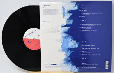 Back cover and record of Elton John Diamonds vinyl LP with tracklist and liner notes