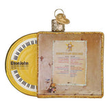 Back view of Elton John 'Goodbye Yellow Brick Road' ornament displaying tracklist and yellow record