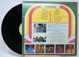 Vinyl record 'Elvin Bishop Juke Joint Jump' with a colorful back cover featuring a jukebox design and album artwork.