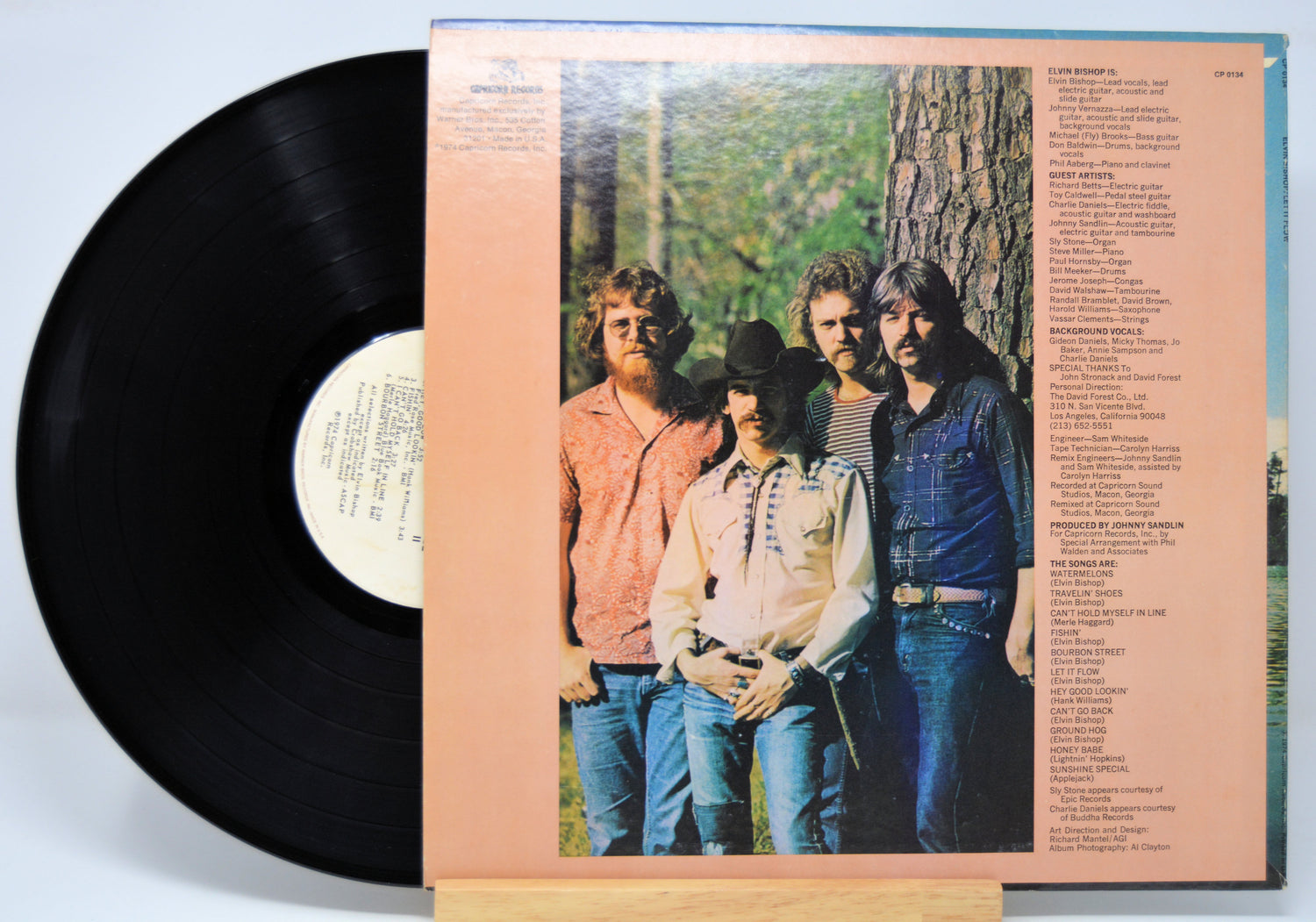 Vinyl record 'Elvin Bishop Let It Flow'  with a cover featuring a group of people outdoors.