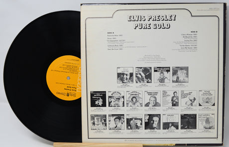 Vinyl record with 'Elvis Presley Pure Gold' cover showing black and white album design.