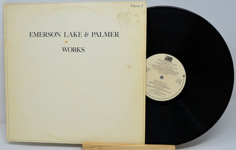 Vinyl record and cover for 'Works' by Emerson Lake & Palmer on a light gray background