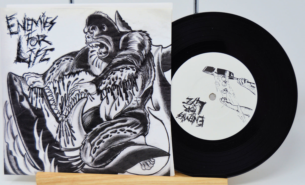 Vinyl record with a black and white illustration on the cover