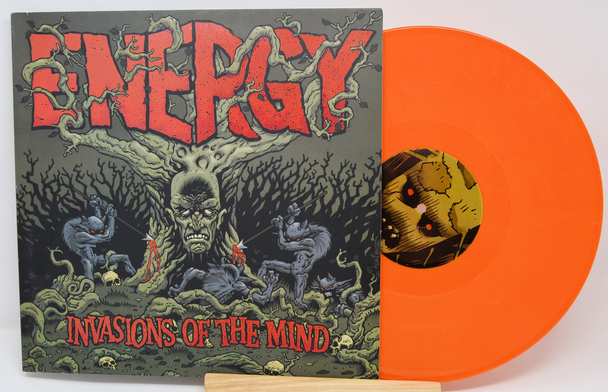 Front cover of Energy Invasions of the Mind orange vinyl featuring horror comic artwork
