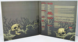 Inner gatefold of Energy Invasions of the Mind vinyl with lyrics and skull artwork