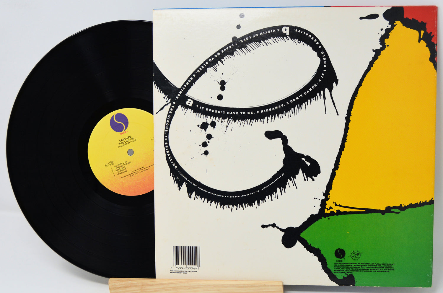 Vinyl record with a colorful cover featuring abstract art