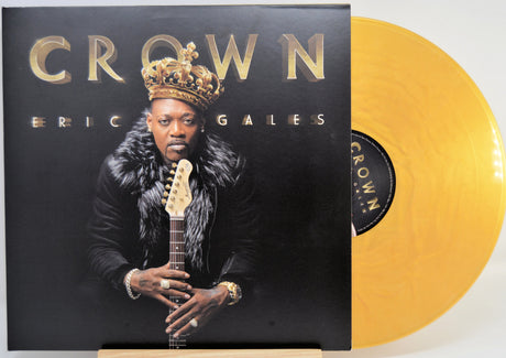 Front cover of Eric Gales' Crown yellow vinyl LP featuring the artist holding a guitar wearing a crown