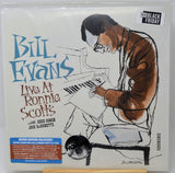Bill Evans 'Live At Ronnie Scott's' vinyl record cover in a clear plastic sleeve, with an illustrated seated pianist and text including a '30 Days Black Friday' sticker and a blue release info label.