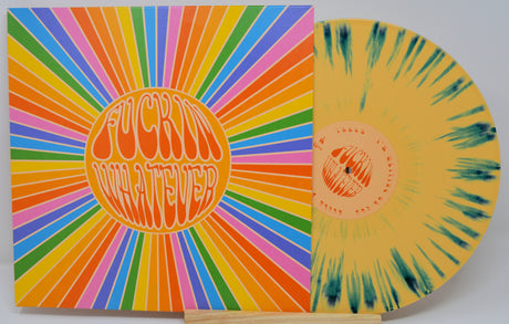 Front cover of F*ckin Whatever vinyl LP with rainbow psychedelic rays and yellow splatter vinyl