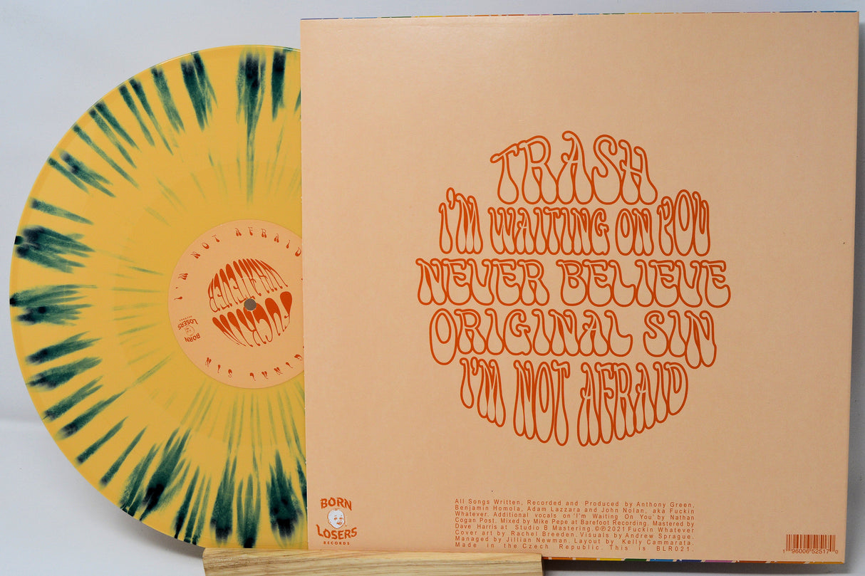 Back cover and yellow splatter vinyl of F*ckin Whatever LP, featuring psychedelic typography and tracklist