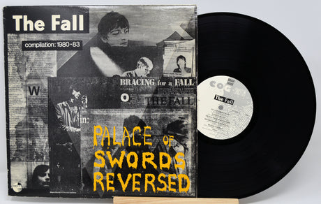 Vinyl record and cover titled 'Palace of Swords Reversed' by The Fall on a white background