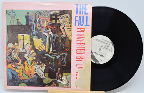 Vinyl record with cover featuring abstract art and text 'The Fall Perverted By Life'.